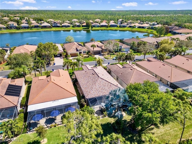 aerial view featuring a water view and a residential view