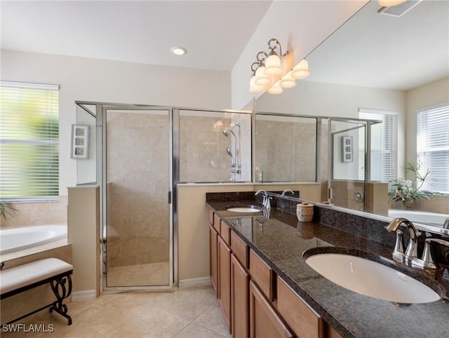 full bath with a garden tub, a sink, and a shower stall