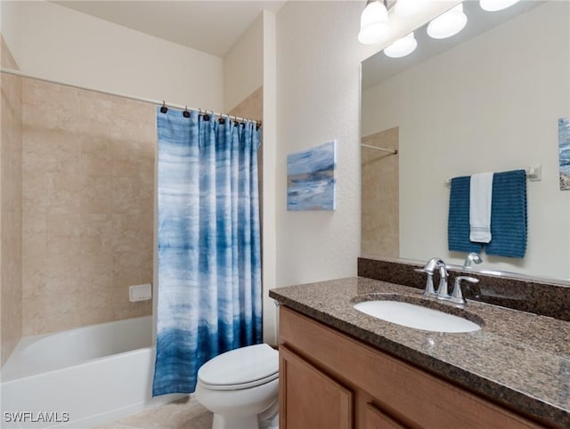 bathroom with tile patterned flooring, shower / tub combo with curtain, vanity, and toilet