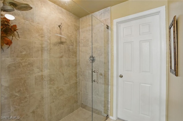 full bathroom with a shower stall