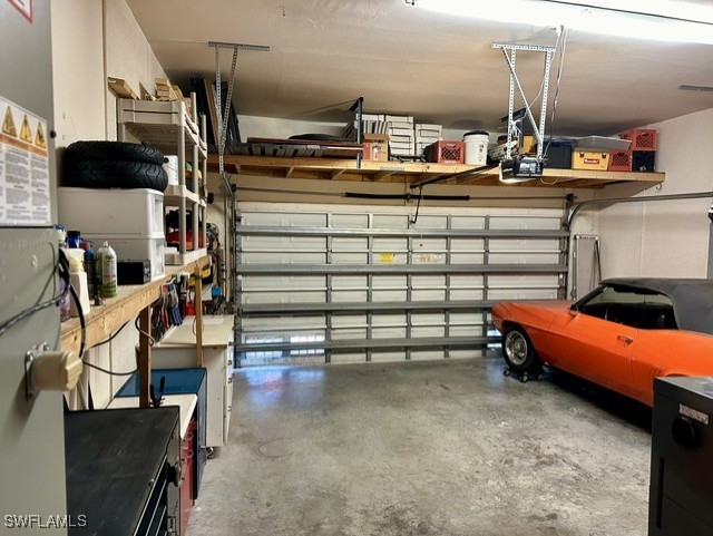 garage featuring a garage door opener