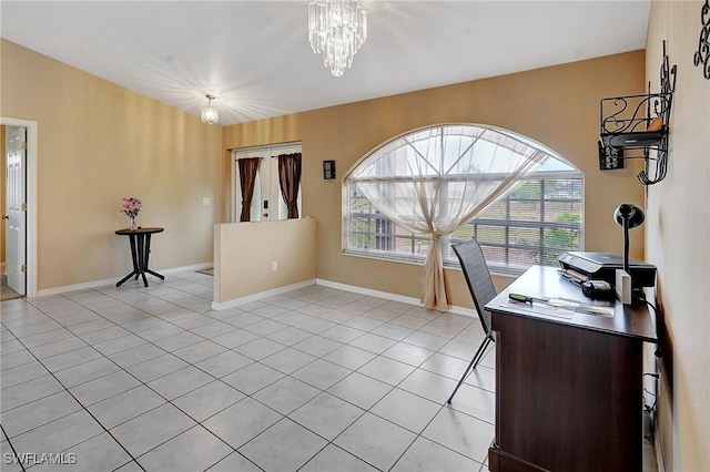 home office featuring light tile patterned floors, baseboards, and a notable chandelier