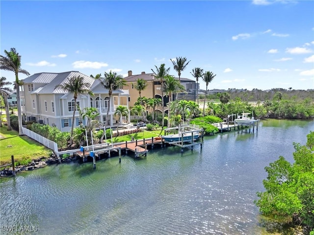 exterior space featuring a residential view and a boat dock