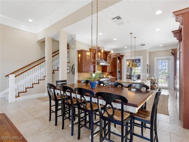 dining room featuring visible vents, baseboards, stairway, ornamental molding, and recessed lighting