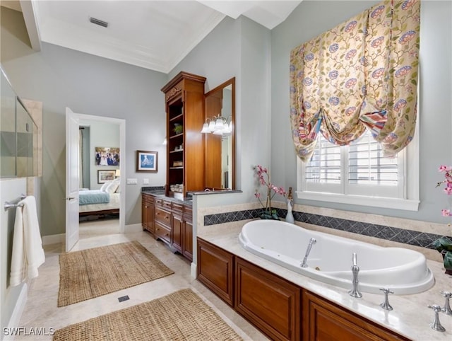 ensuite bathroom with visible vents, a stall shower, ensuite bathroom, crown molding, and a bath