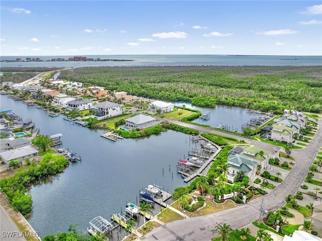 aerial view featuring a water view and a residential view