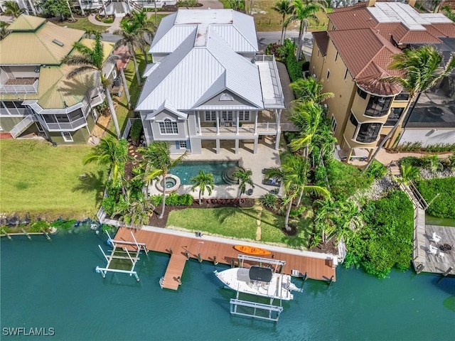 bird's eye view with a water view