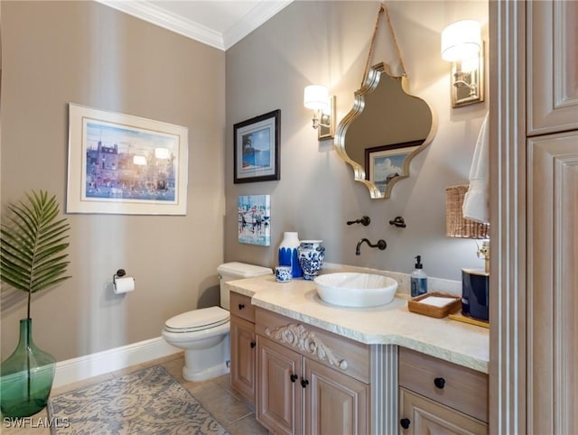 half bathroom featuring vanity, baseboards, ornamental molding, tile patterned floors, and toilet