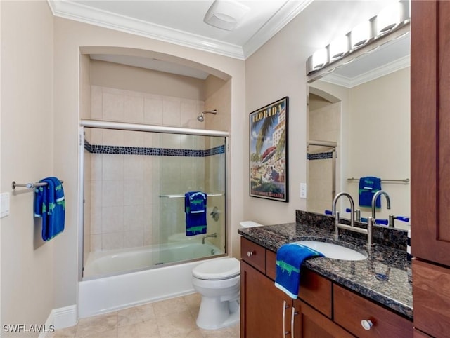 bathroom with combined bath / shower with glass door, vanity, crown molding, and toilet