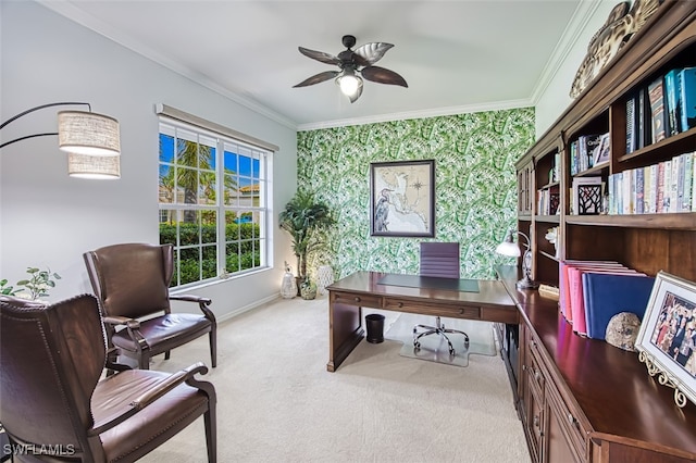 carpeted office with wallpapered walls, an accent wall, baseboards, and ornamental molding