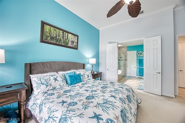 bedroom featuring ensuite bath, crown molding, ceiling fan, and carpet floors