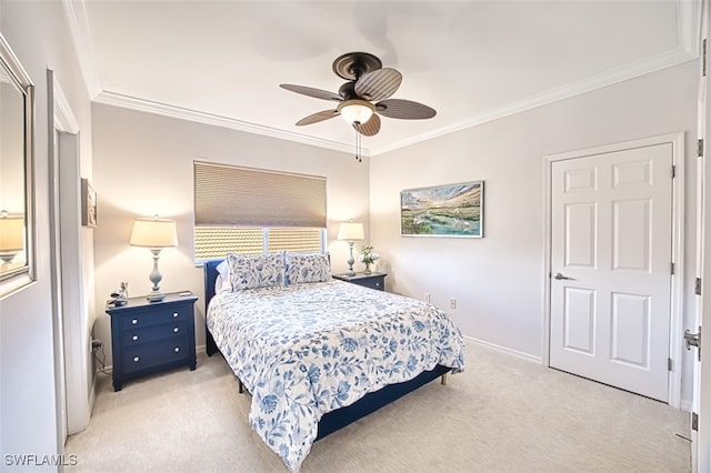 bedroom featuring ceiling fan, crown molding, baseboards, and light carpet