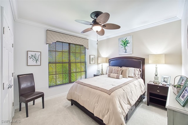 bedroom featuring ceiling fan, light colored carpet, baseboards, and ornamental molding