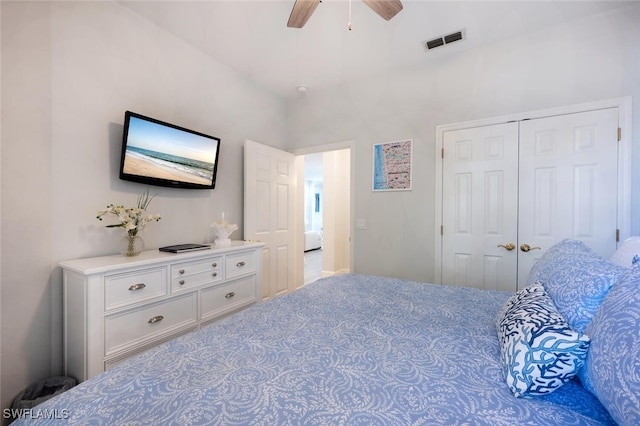 bedroom with a ceiling fan, a closet, and visible vents