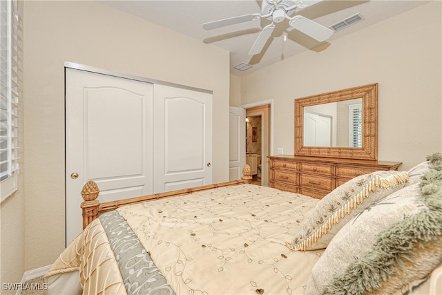 bedroom with visible vents, a closet, and ceiling fan