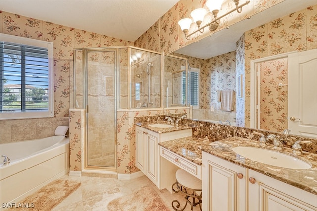 bathroom featuring wallpapered walls, double vanity, a stall shower, a sink, and a bath