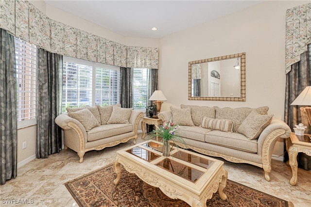 living room featuring baseboards