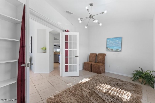 sitting room featuring visible vents, a notable chandelier, and light tile patterned floors