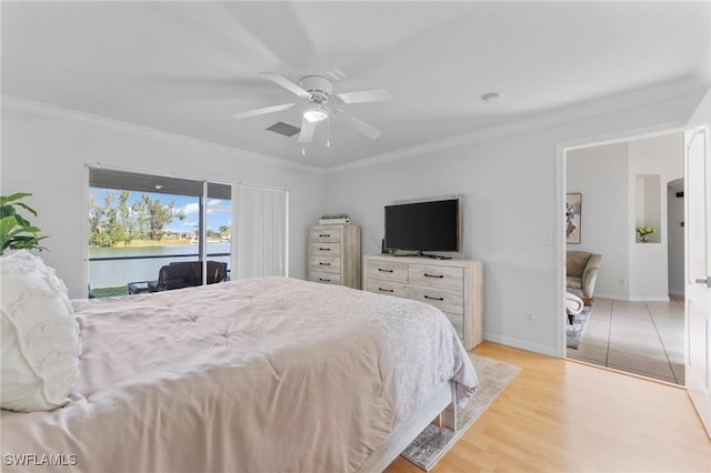 bedroom with baseboards, access to outside, light wood-type flooring, and crown molding