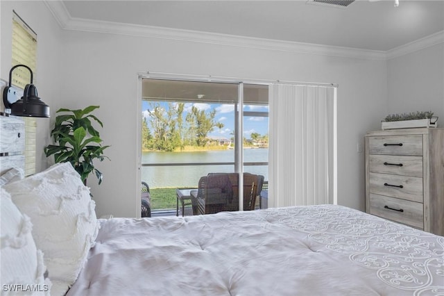 bedroom featuring access to exterior, a water view, ornamental molding, and visible vents