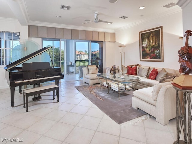 living area featuring visible vents, crown molding, and ceiling fan