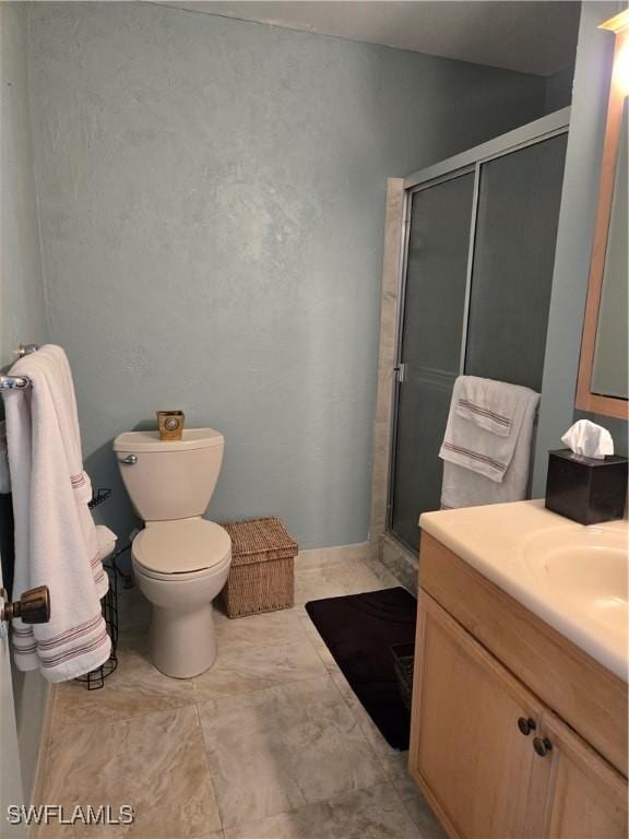 5910 Via Delray Blvd Unit B, Delray Beach, FL 33484 - bathroom featuring a stall shower, toilet, and vanity