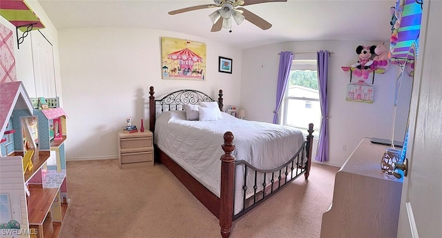 carpeted bedroom with a ceiling fan and baseboards