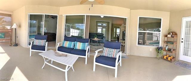 view of patio featuring a ceiling fan