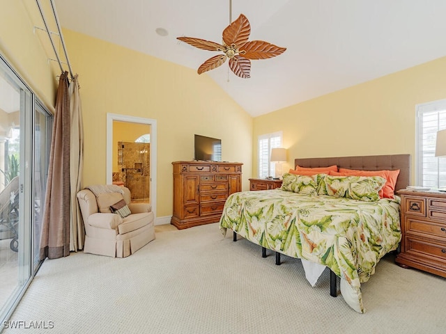 carpeted bedroom featuring ceiling fan, high vaulted ceiling, and connected bathroom