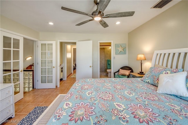 bedroom with french doors, recessed lighting, visible vents, light tile patterned flooring, and connected bathroom