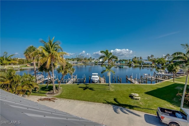 property view of water featuring a dock and boat lift