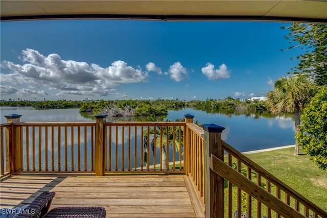 deck featuring a water view