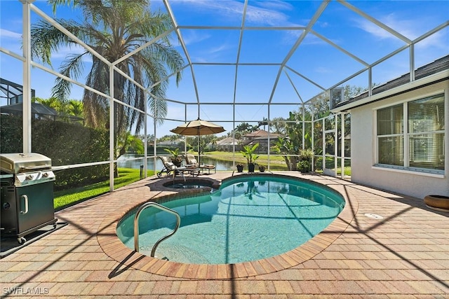 view of pool featuring a patio, a pool with connected hot tub, a water view, grilling area, and a lanai