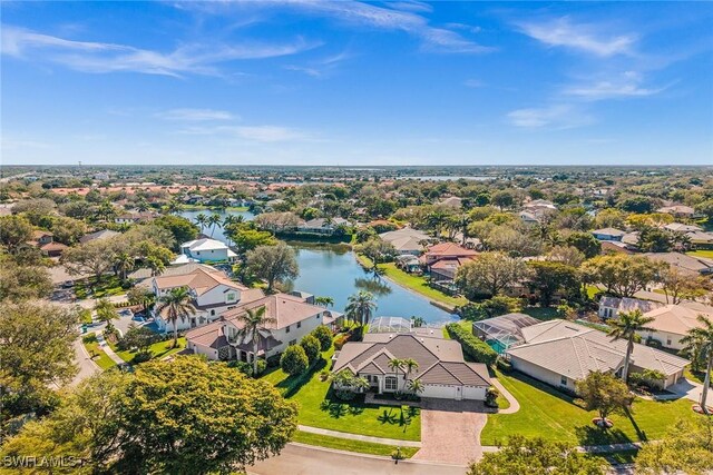 bird's eye view with a residential view and a water view