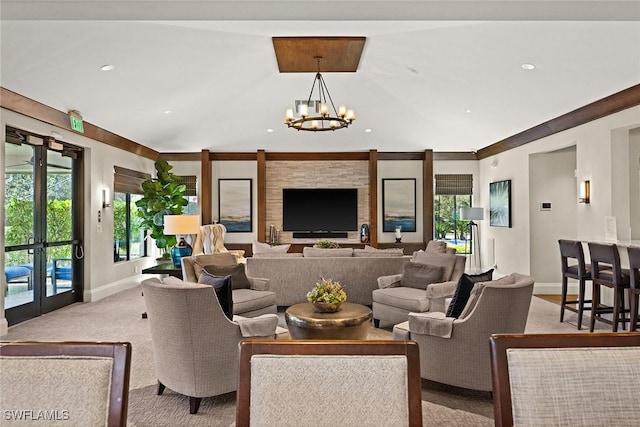 carpeted living area with a chandelier, recessed lighting, vaulted ceiling, and baseboards