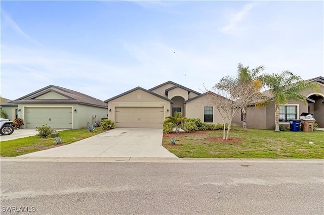 ranch-style home with an attached garage, a front yard, concrete driveway, and stucco siding