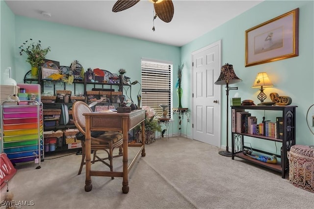 carpeted office with ceiling fan