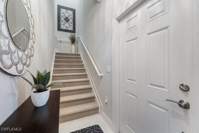 staircase with baseboards