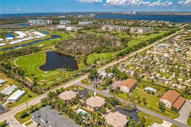 birds eye view of property featuring a water view and golf course view