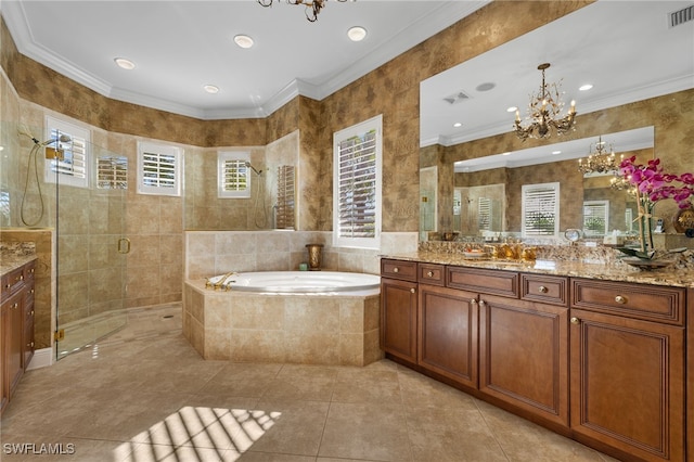 bathroom with tiled shower, a notable chandelier, and a healthy amount of sunlight