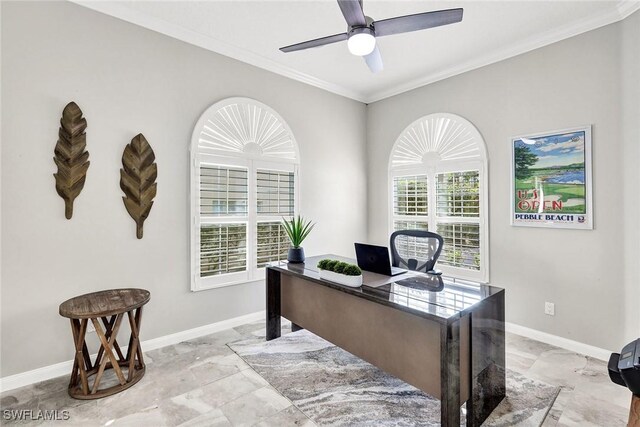 home office featuring ornamental molding, a ceiling fan, and baseboards