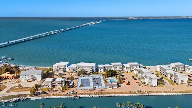 bird's eye view featuring a residential view and a water view