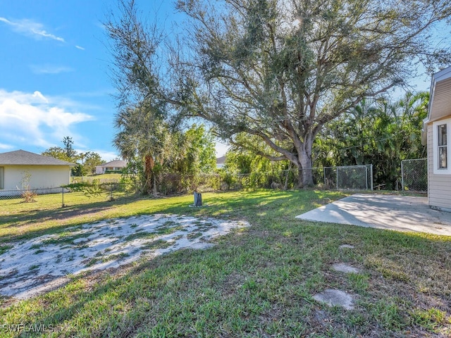 view of yard featuring a fenced backyard and a patio