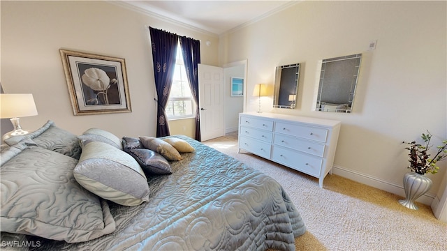 bedroom featuring baseboards, ornamental molding, and light colored carpet