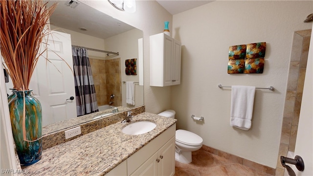 full bathroom with toilet, visible vents, vanity, baseboards, and tile patterned floors