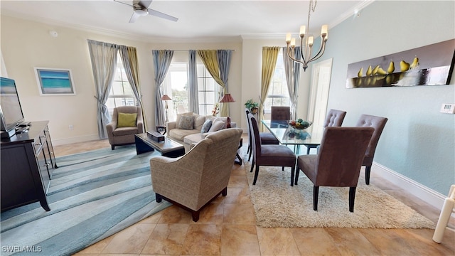 dining area featuring light tile patterned flooring, baseboards, ornamental molding, and ceiling fan with notable chandelier