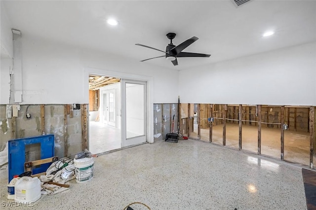 miscellaneous room with a ceiling fan, recessed lighting, and speckled floor