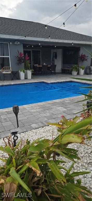 outdoor pool with a patio