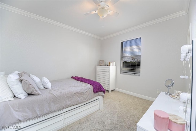 bedroom with a ceiling fan, light colored carpet, crown molding, and baseboards