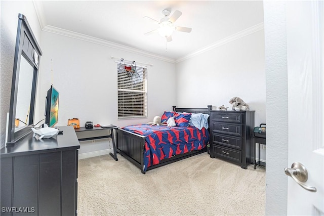 bedroom with carpet, baseboards, ceiling fan, and crown molding